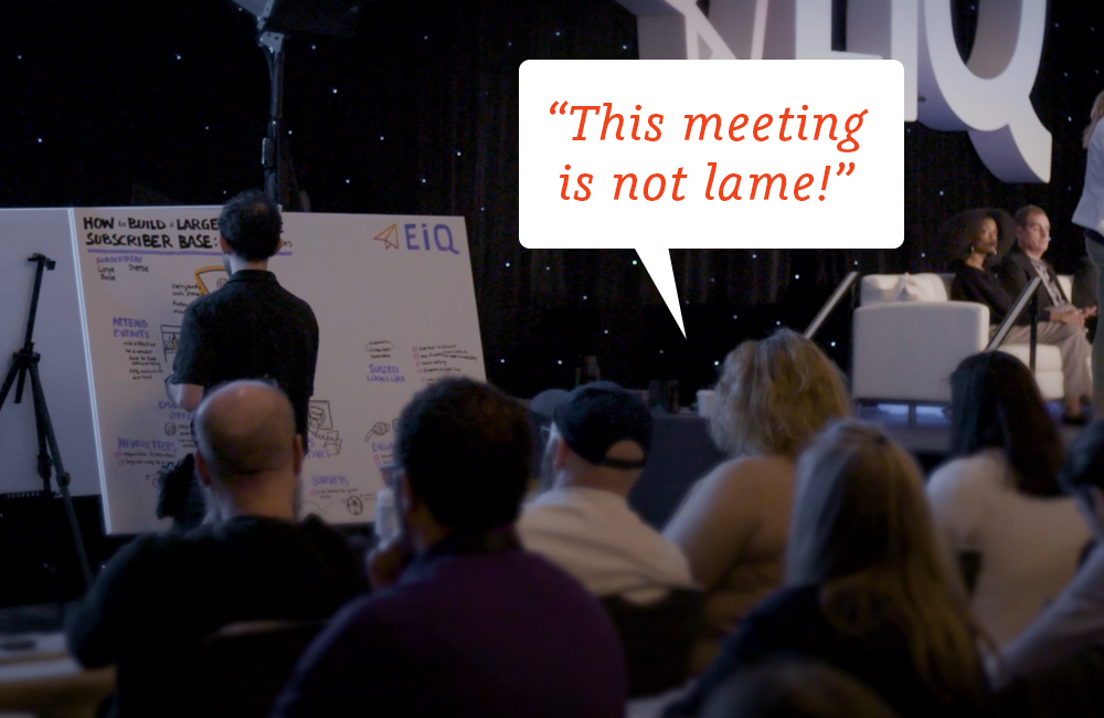 Photograph of audience during live sketch with a caption bubble that reads "This meeting is not lame!"